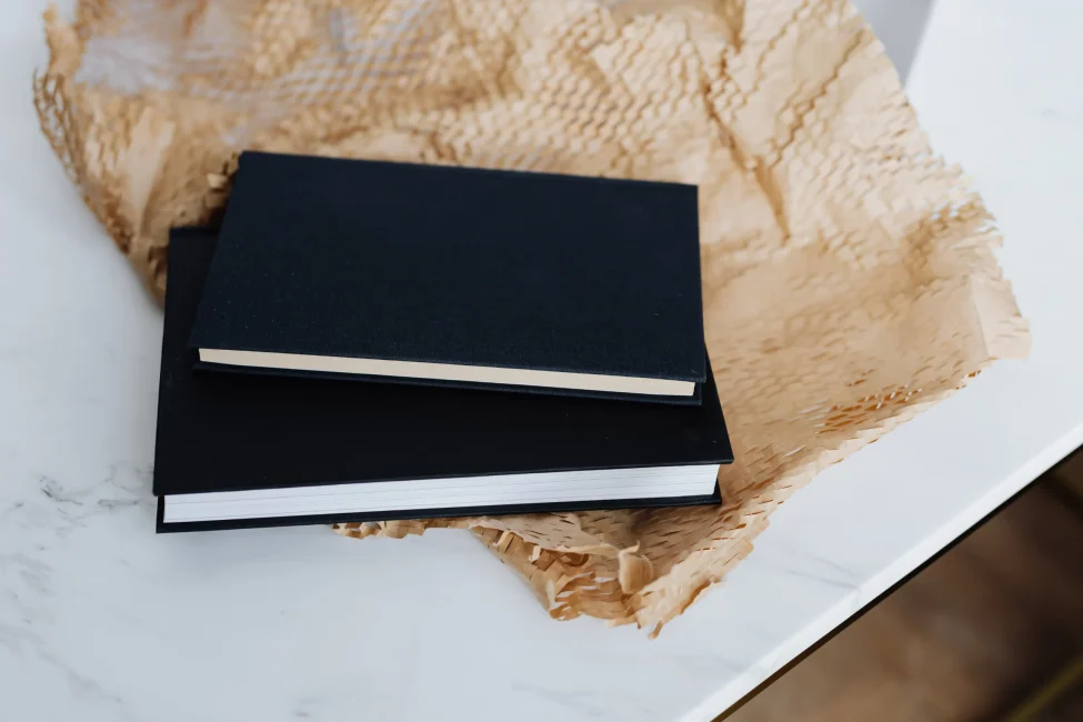 15 Notebooks on a desk